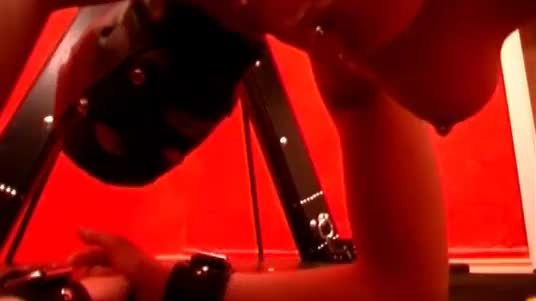 Mistress in leather plays with kinky
